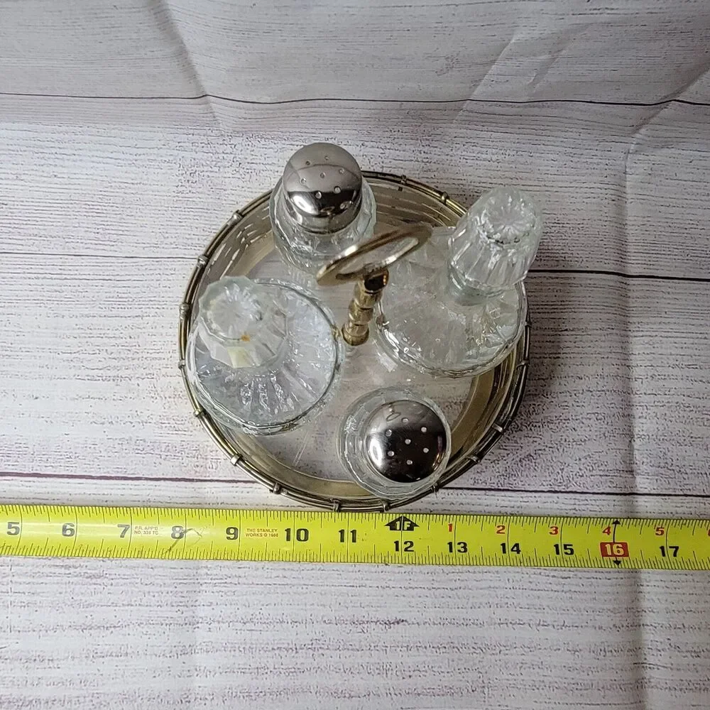 Vintage brass salt, pepper, vinegar, and oil jars with holder table-centerpiece
